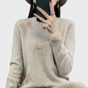 Pull à col roulé en tricot avec motif papillon