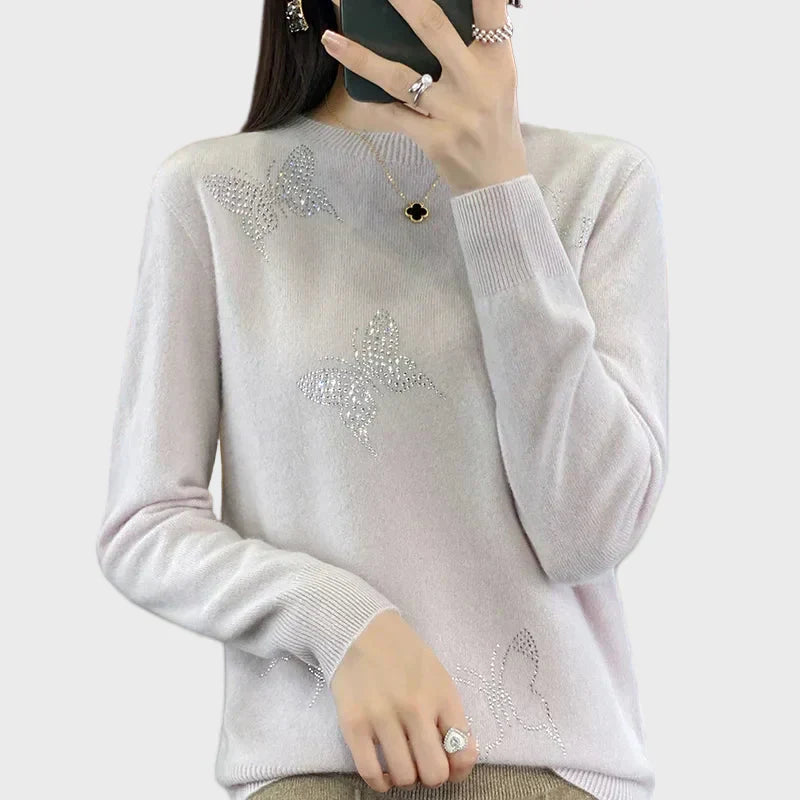Pull à col roulé en tricot avec motif papillon